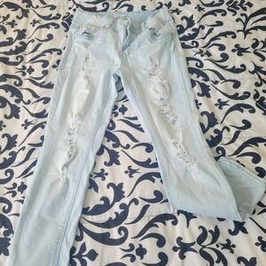 Refuge Jean's size 6 light wash with holes